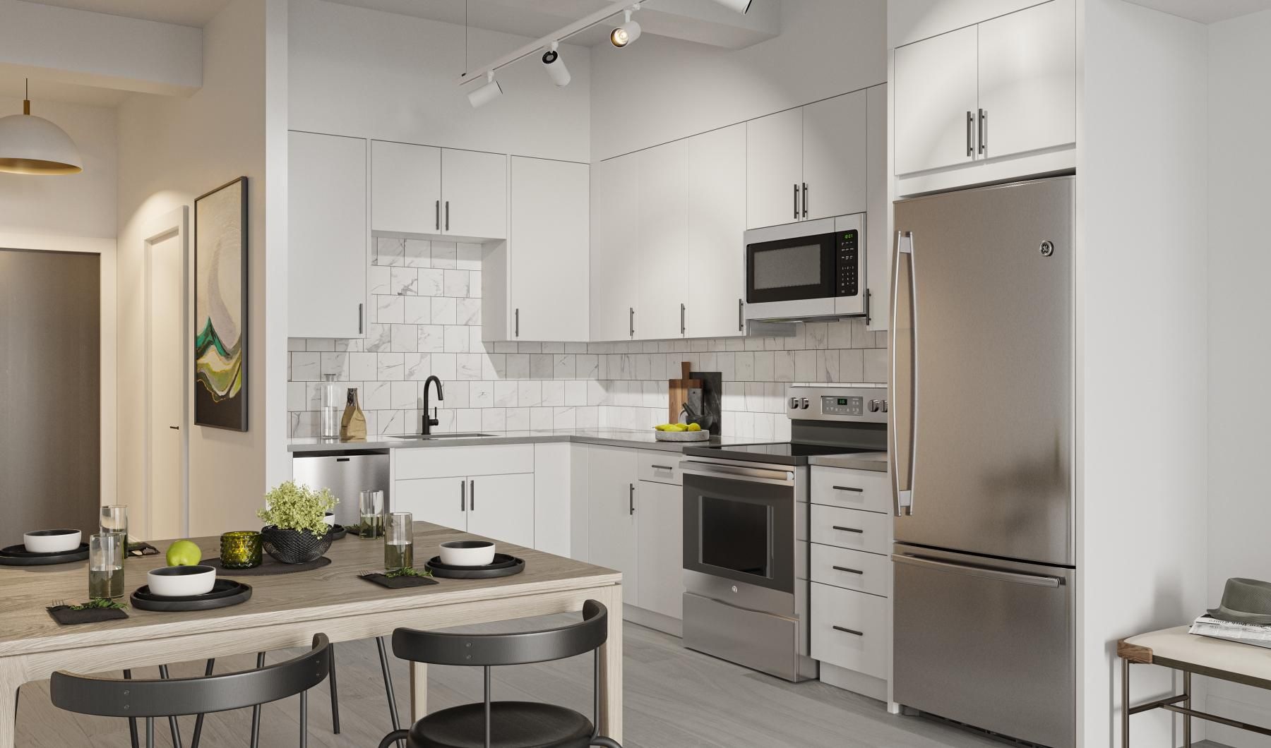 a kitchen with white cabinets