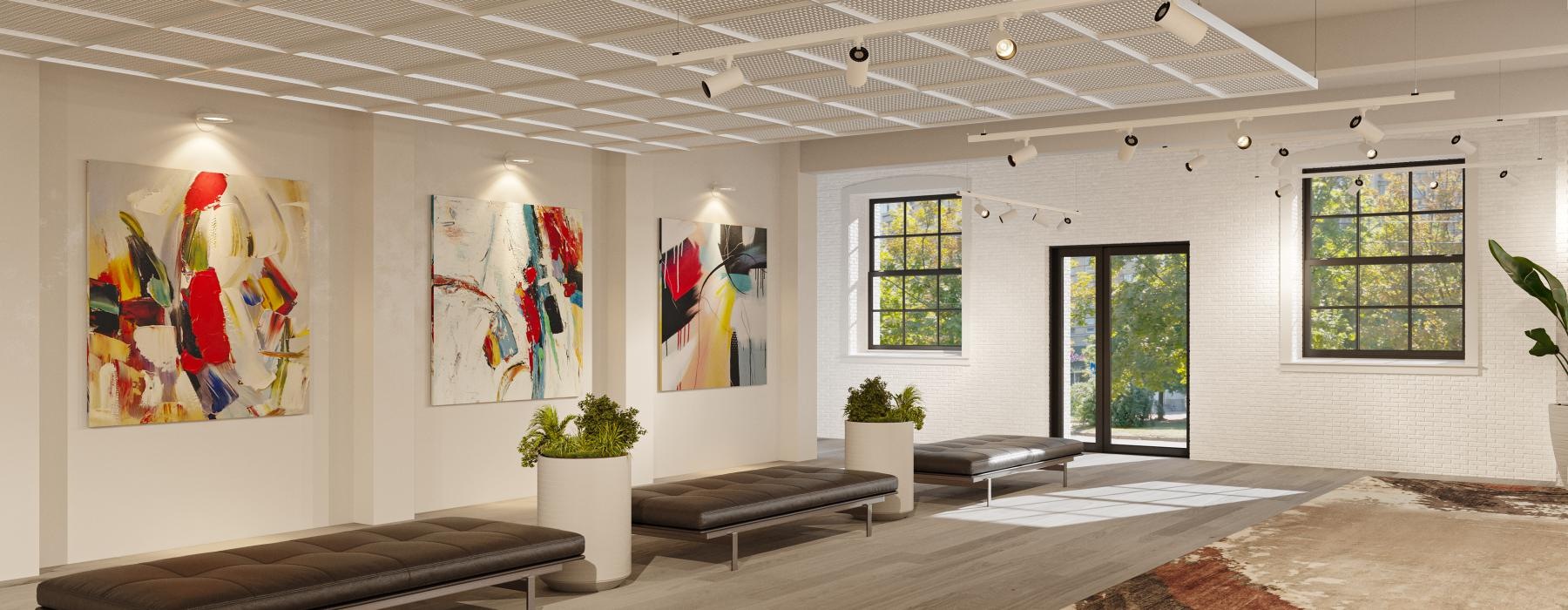 a large room with a rug and benches